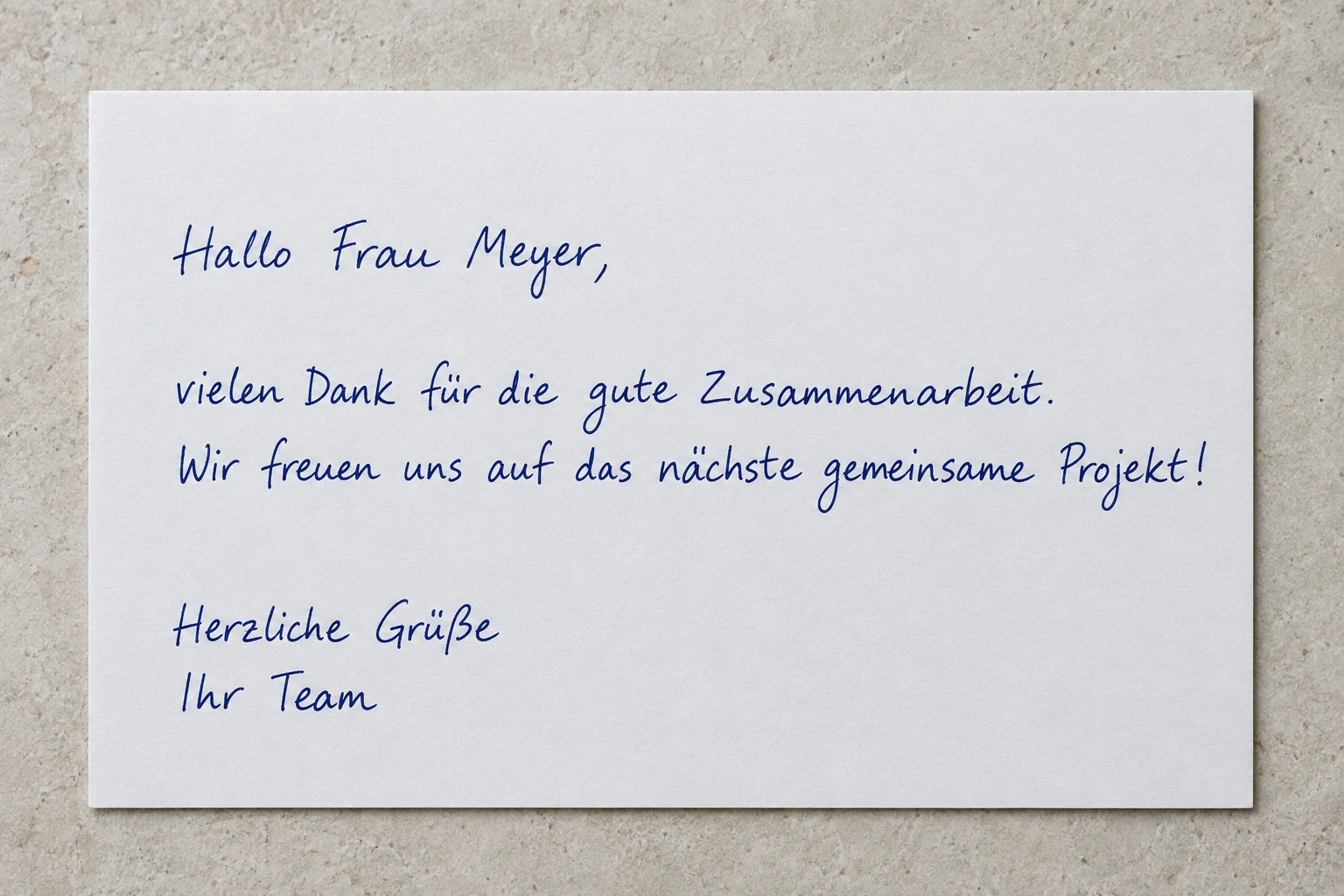 Handgeschriebene Dankeskarte als persönlicher Paketbeileger.
